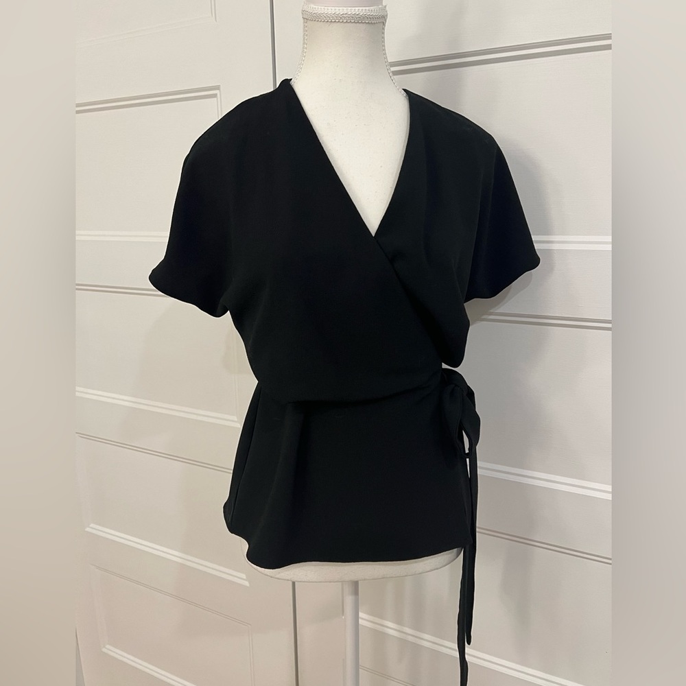 Peplum wrap top
